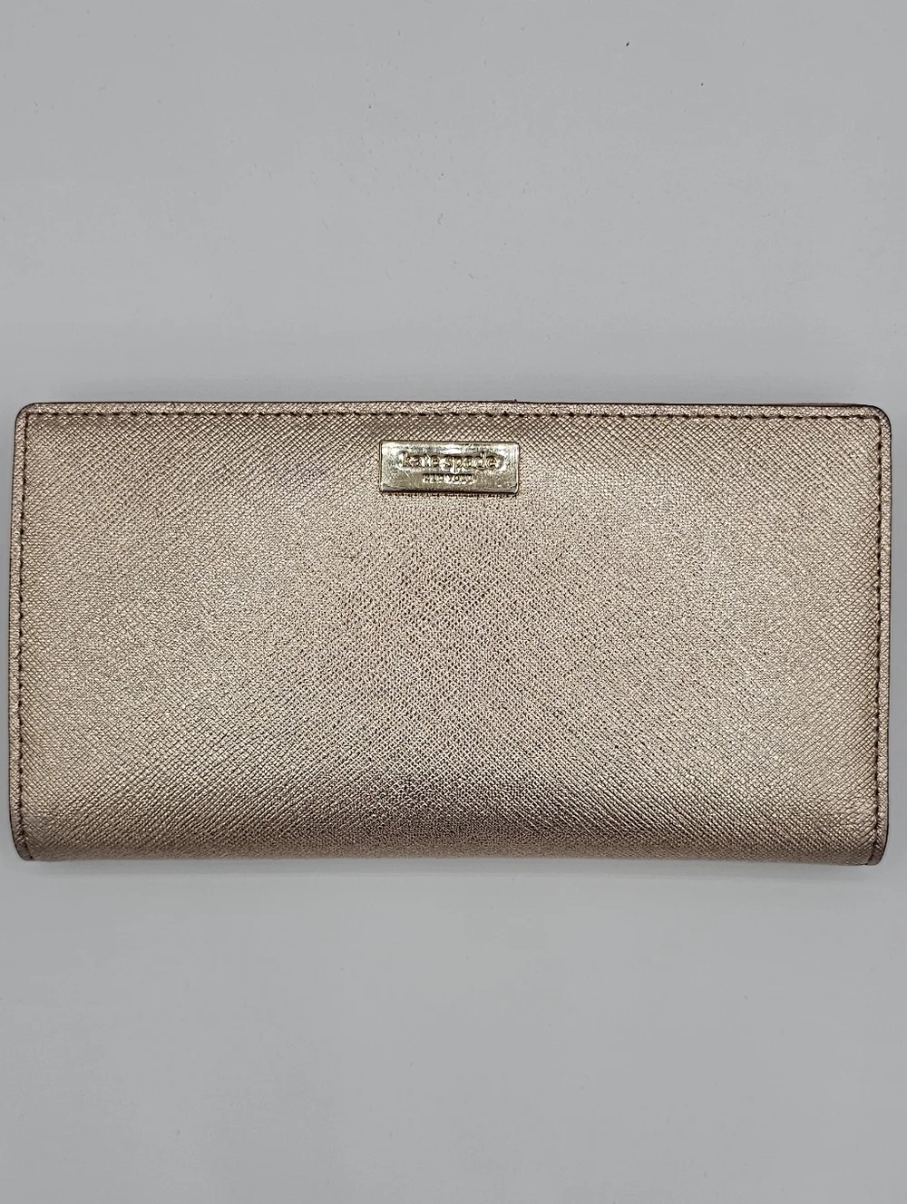 KATE SPADE Metallic Rose Gold Slim Bifold Wallet‎